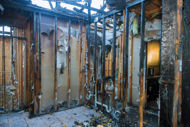 Professional Fire Damage Repair technician working in Stonewall, MS